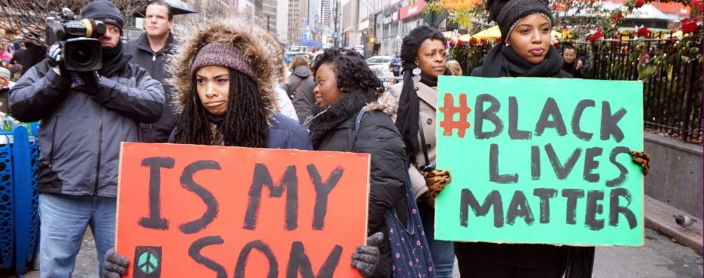 NYC action in solidarity with Ferguson. Mo, encouraging a boycott of Black Friday Consumerism.