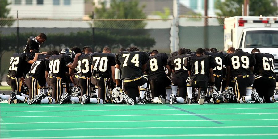 Taking a knee against police brutality