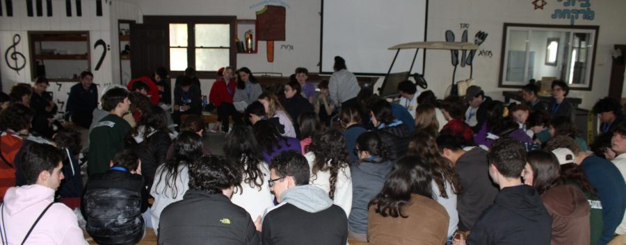 NFTY board and participants engage in a musical program and discuss the deeper meaning of some songs. Photo by Sydney Kraus.