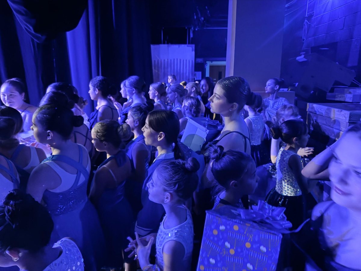 Dancers eagerly waiting backstage for the show to start.