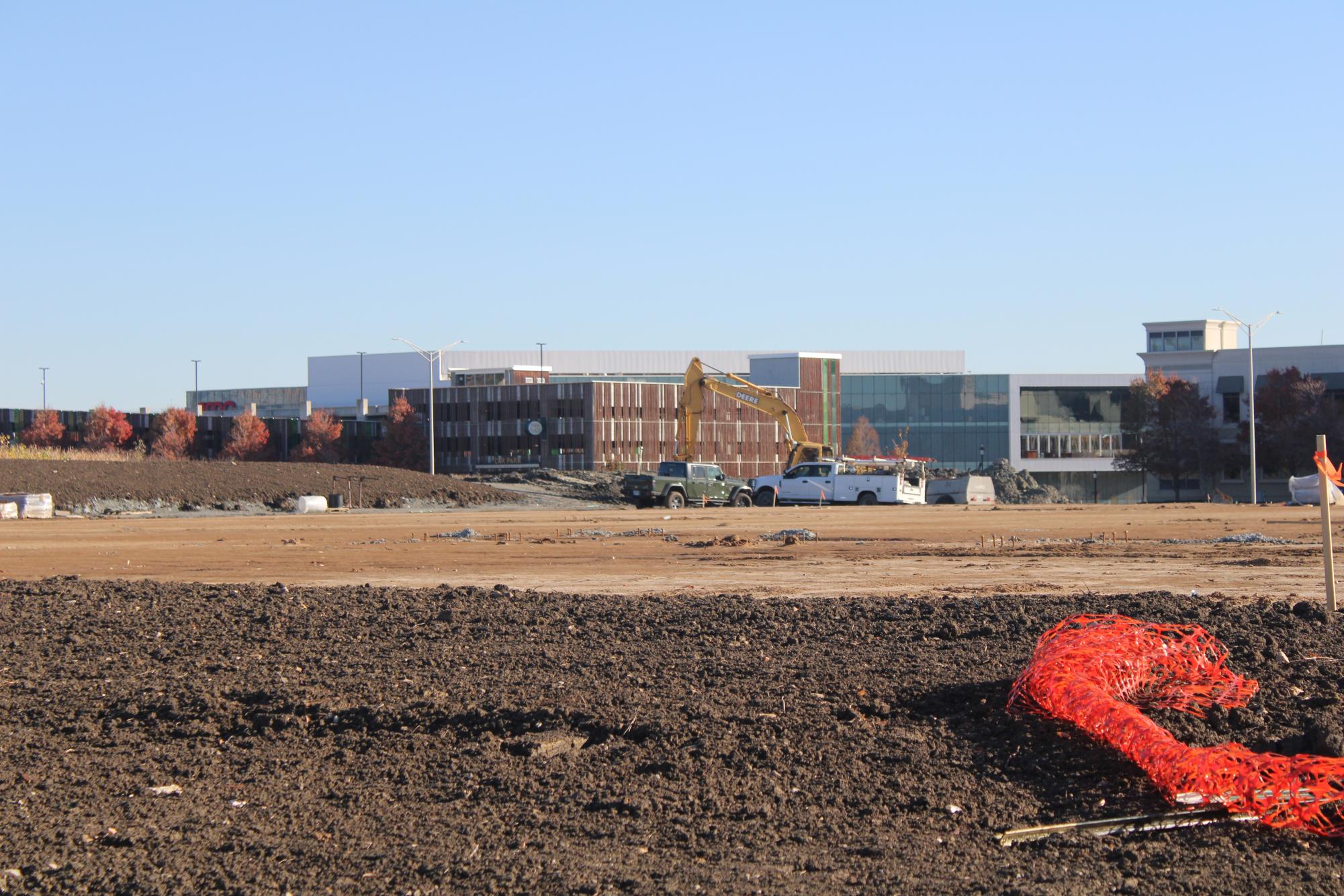 The excavator, and a few pickup trucks from the construction site across the street. Image by Skyler Penner 