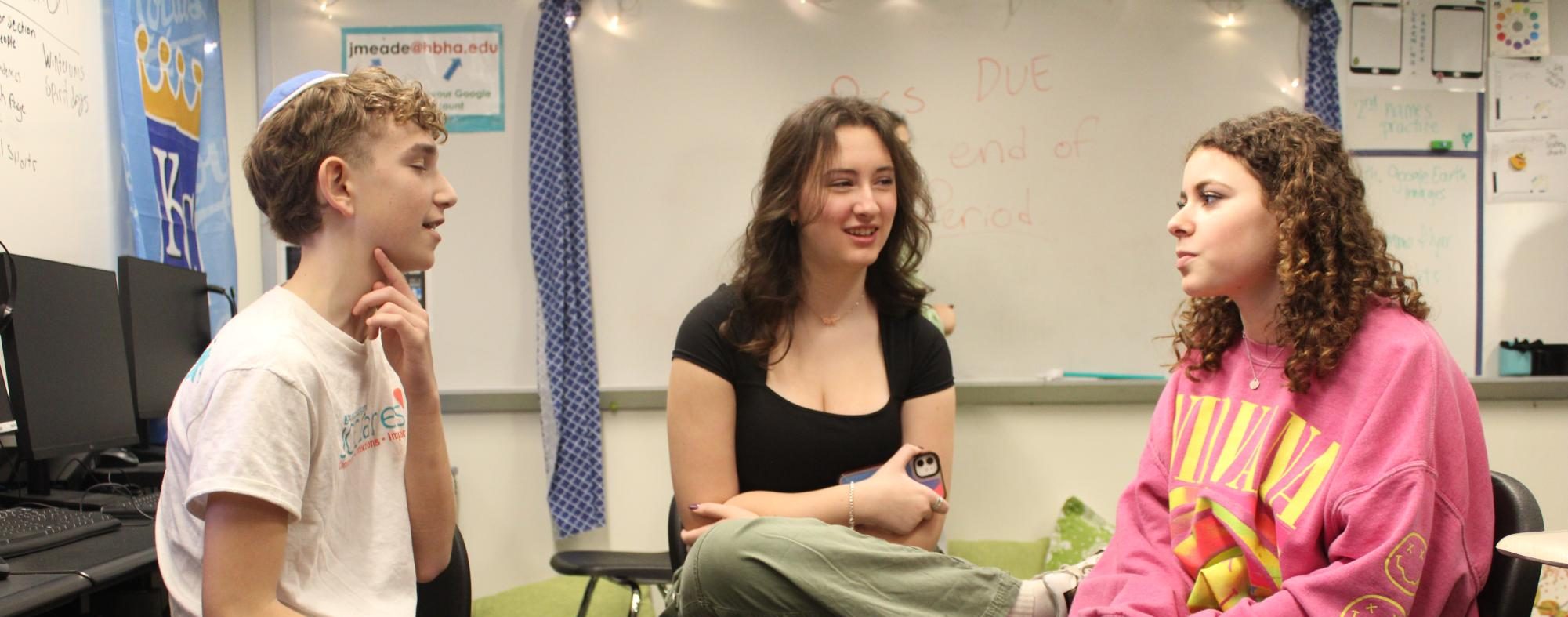 Orli Zigler, Ayla Williams, and Naftali Tilove having a conversation.