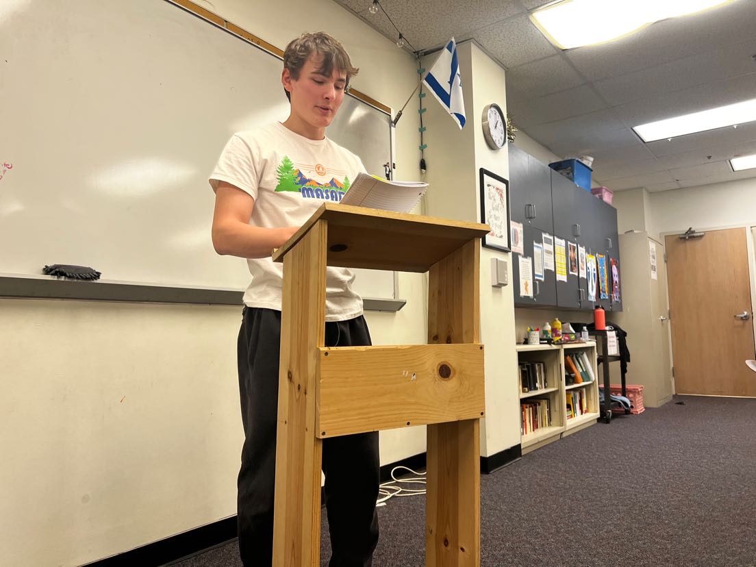 Junior Noah Bergh reciting poetry in front of his peers. Photo by Noah Bergh