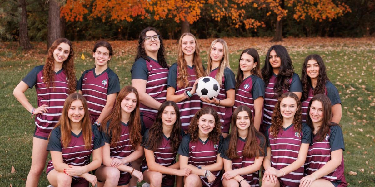 HBHA’s girls' varsity girls soccer team poses together on media day. 