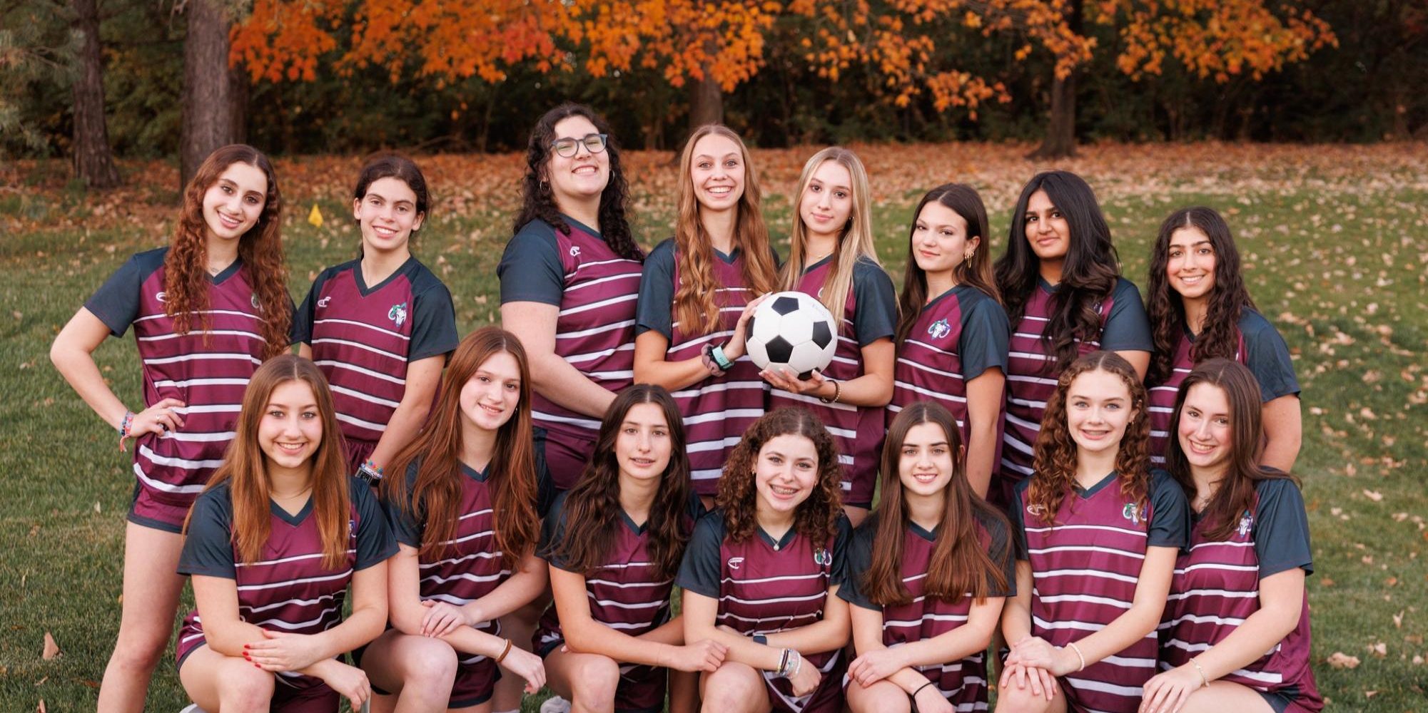 HBHA’s girls' varsity girls soccer team poses together on media day. 