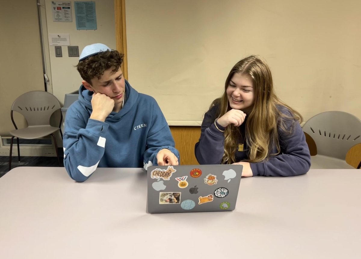 A couple’s time to sit down and work through their future decision, to rent or own. Photo taken by Avital Mullokandova