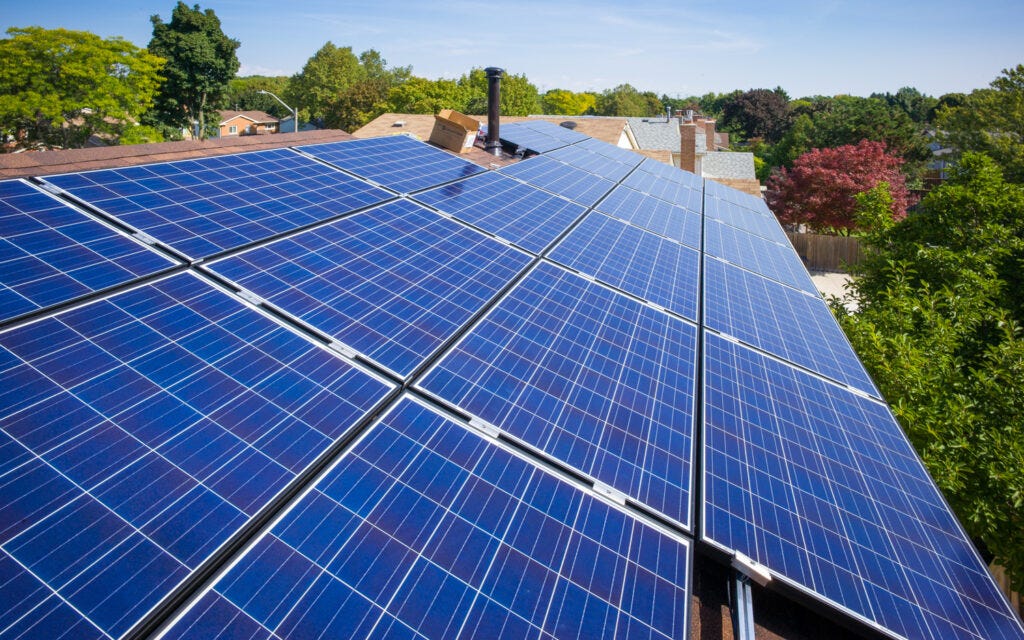 Solar panels being installed on the south side of a residential neighborhood. Solar panels reduce electricity costs, result in financial savings, combat climate change, reduce reliance on fossil fuels, and increase home value. “If they get direct sunlight, they're happy…all those panels are big, facing 180 degrees south for optimal exposure and production,” Amory Bottorff said. Image via Roper